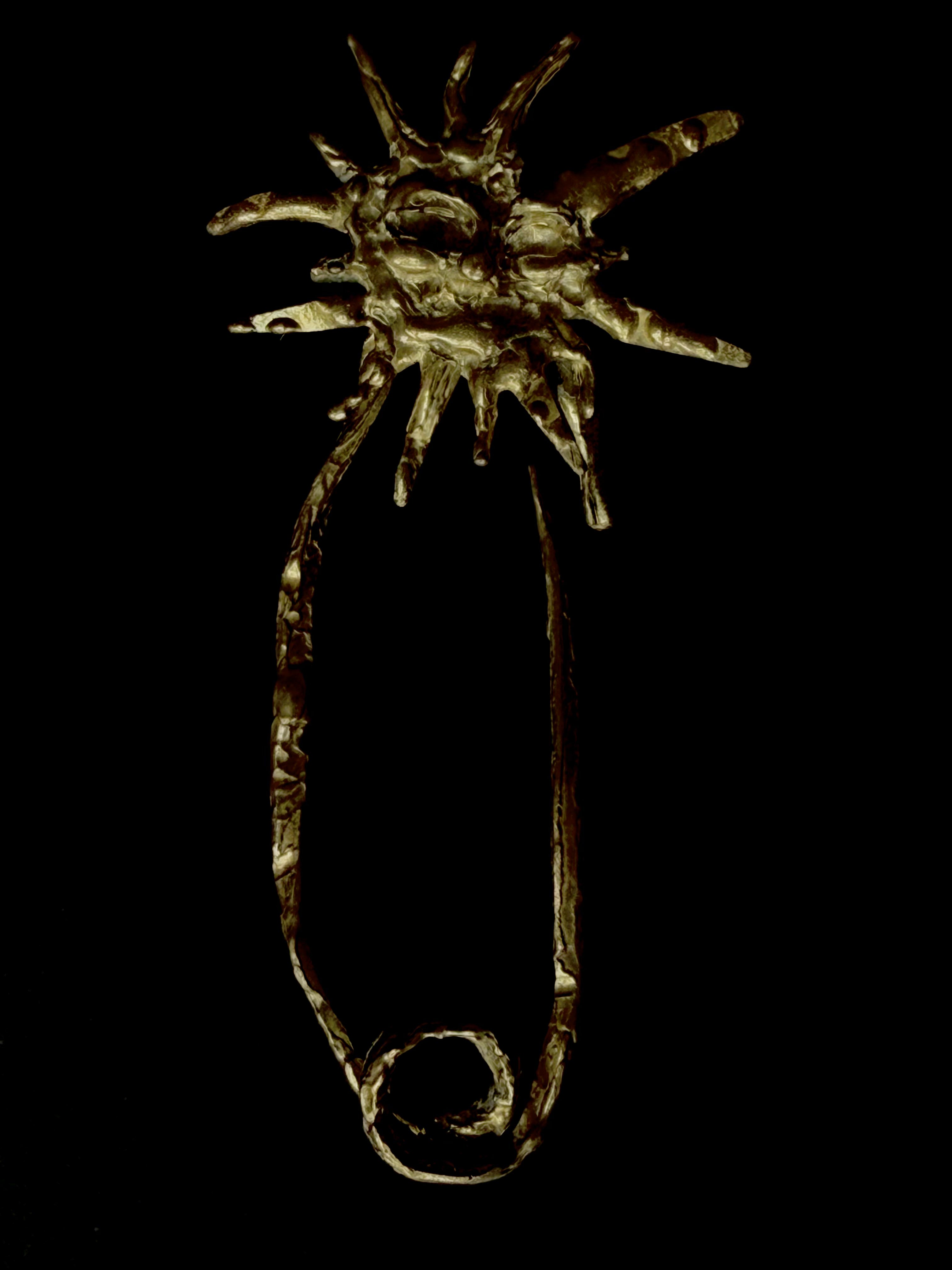PRENDEDOR SOL BRONCE